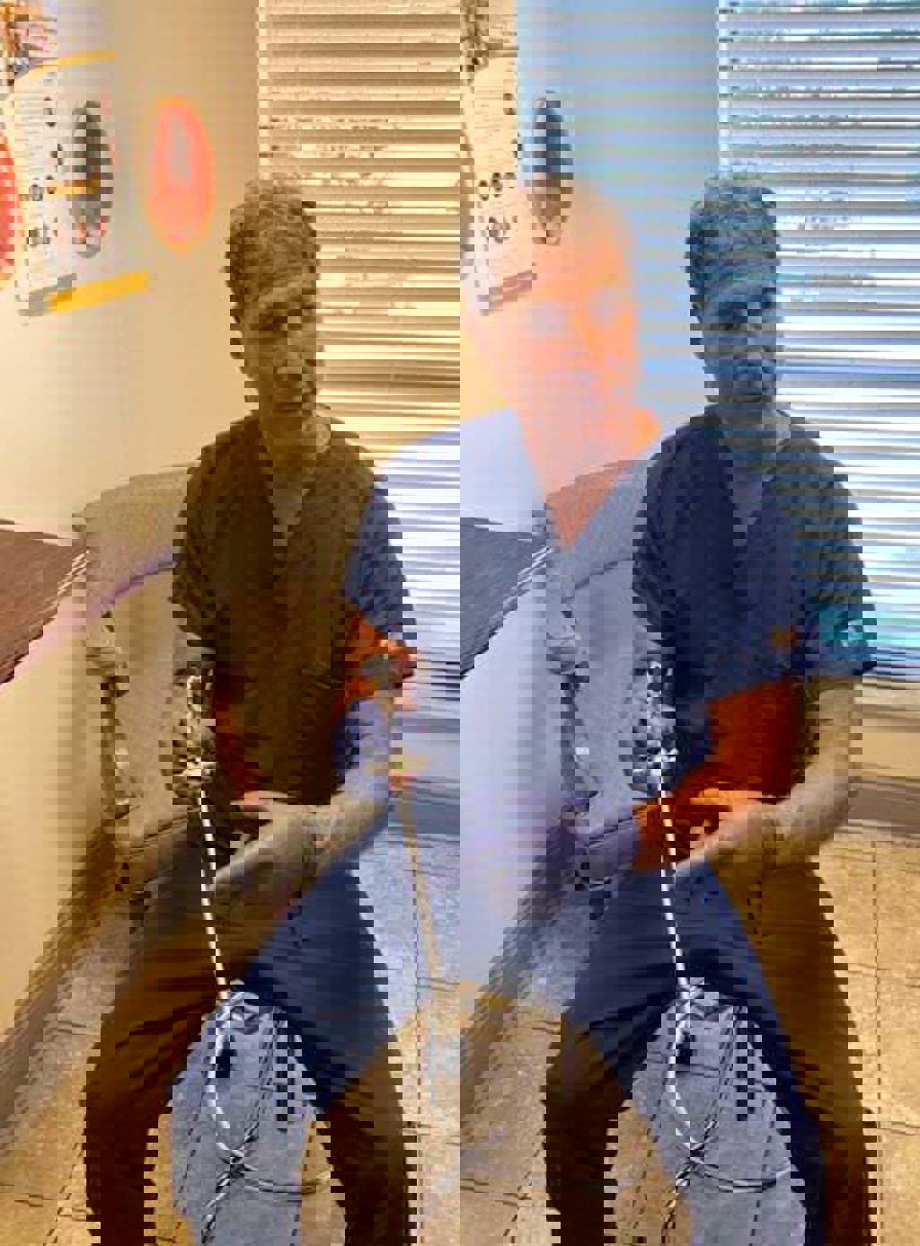 Dr. Michael Pelekanos, a urogynecologist with Penn Highlands Healthcare, explains to a patient how he uses a cystoscope to view the inside of her bladder.