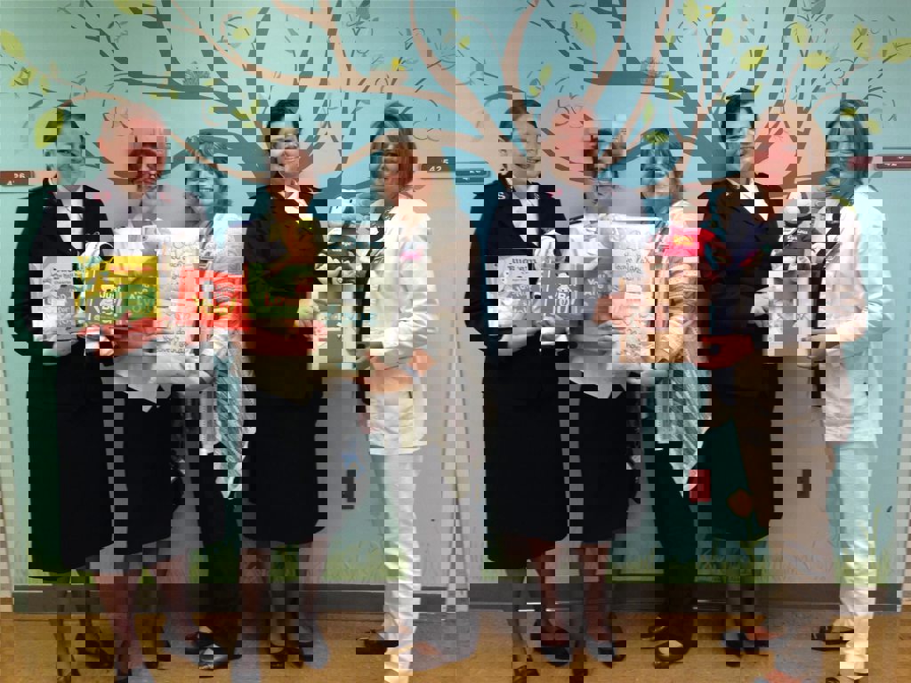 Salvation Army Lieutenants and volunteers with PH DuBois Pediatrics staff.